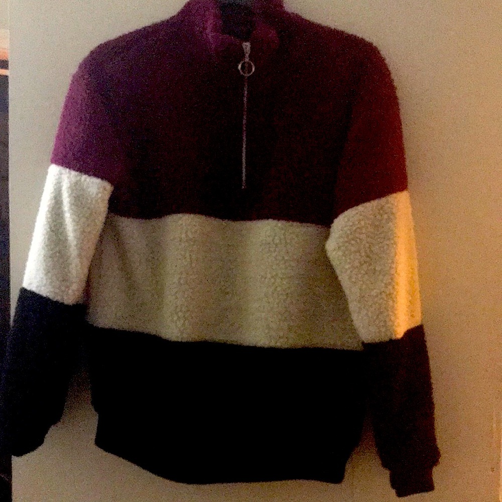 Pull over red,white and black sweater